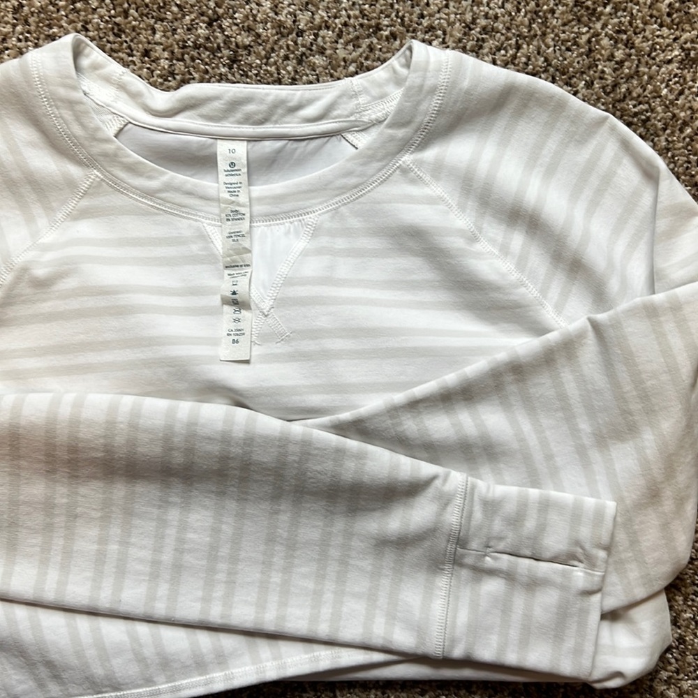 White and light gray lululemon sweatshirt